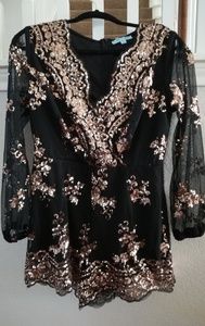 Festive sequined romper.